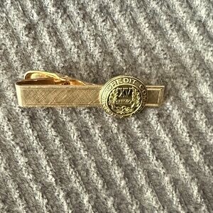 Elegant Gold Tie Bar with Emblem
